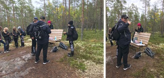 Yläkoululaisia metsässä maistelemassa luonnonmarjoja.
